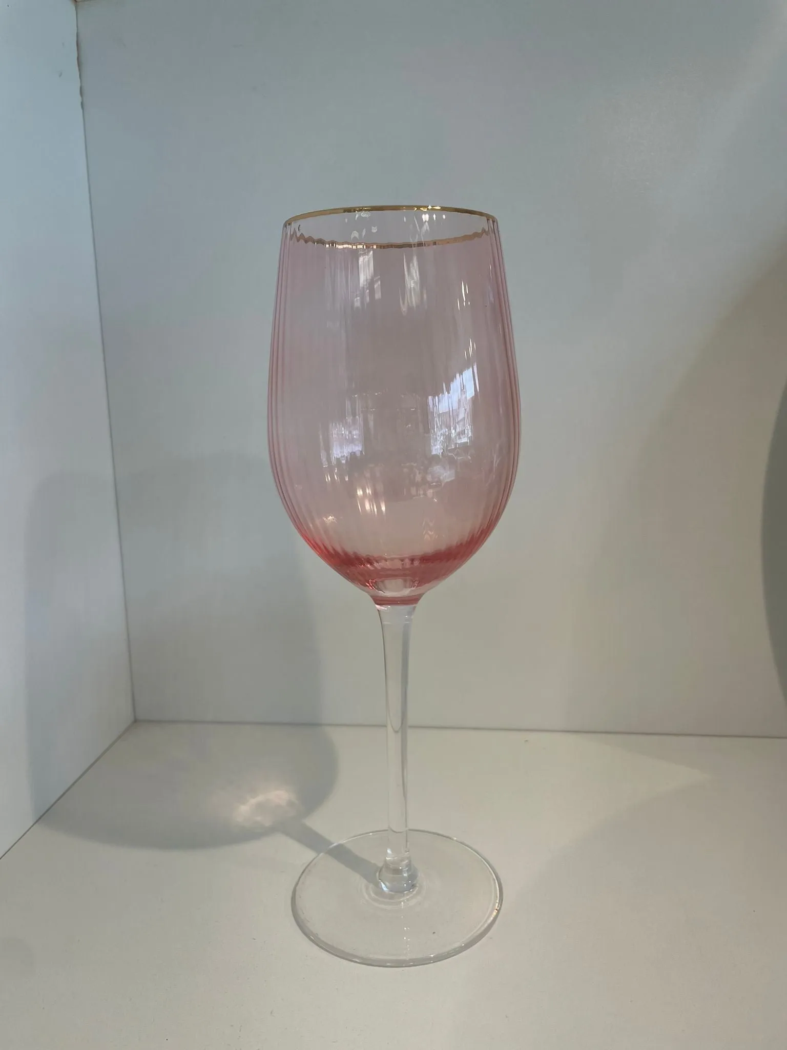 11 oz peach glass with gold rim