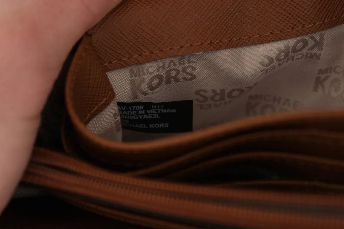 Brown JET SET TRAVEL Carryall Leather Wallet