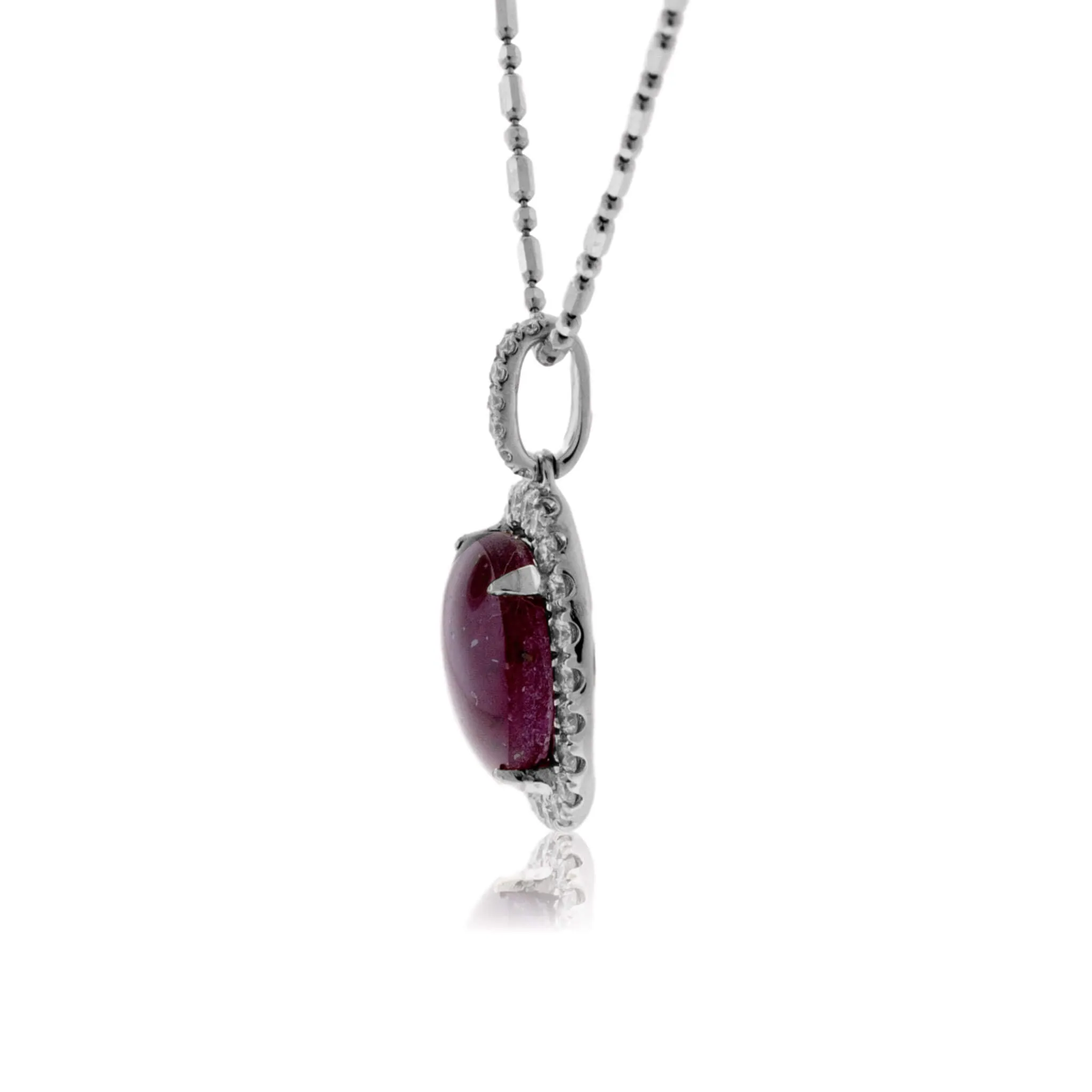 Cabochon Star Ruby with Diamond Halo Pendant