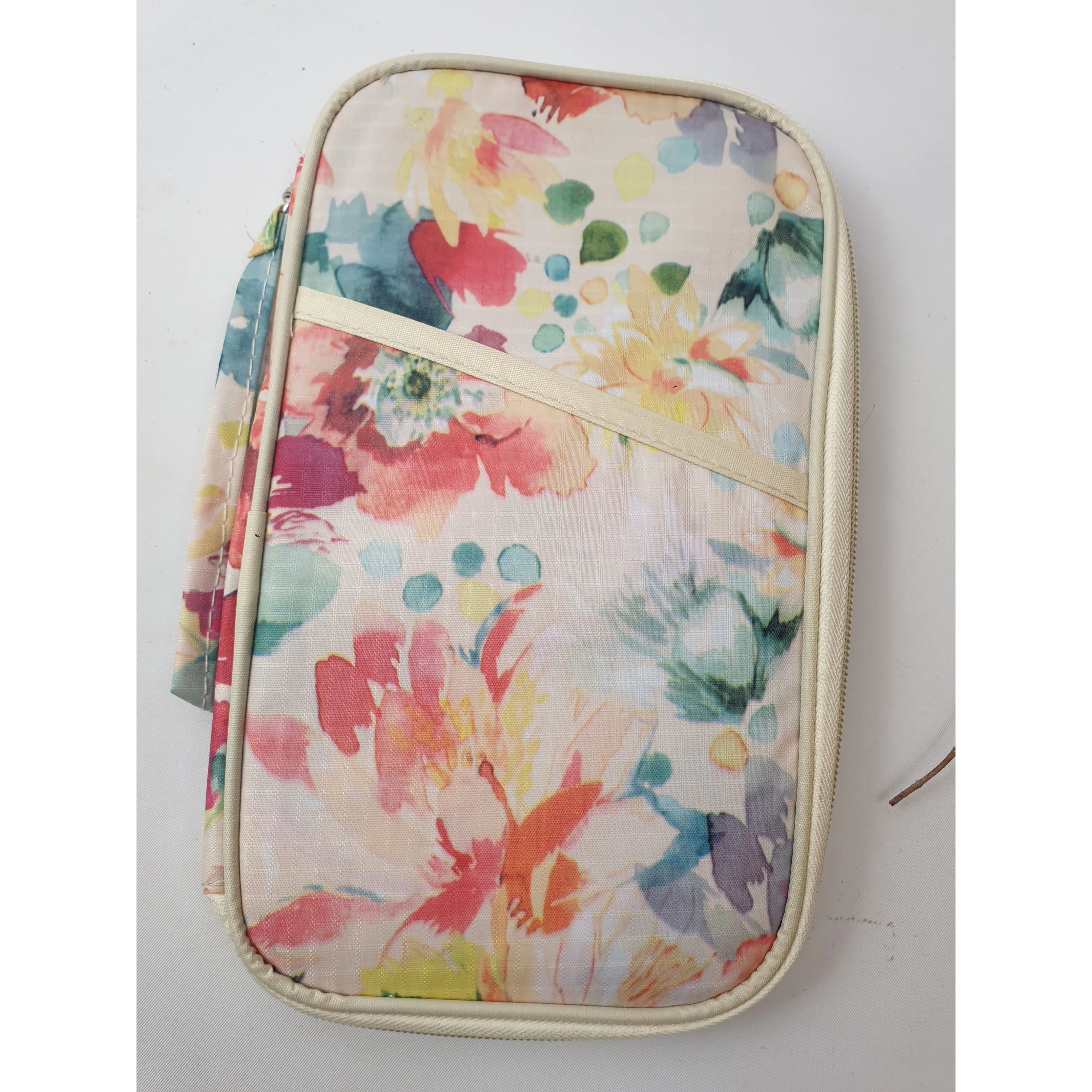 Cute cream-based floral travel purse / clutch