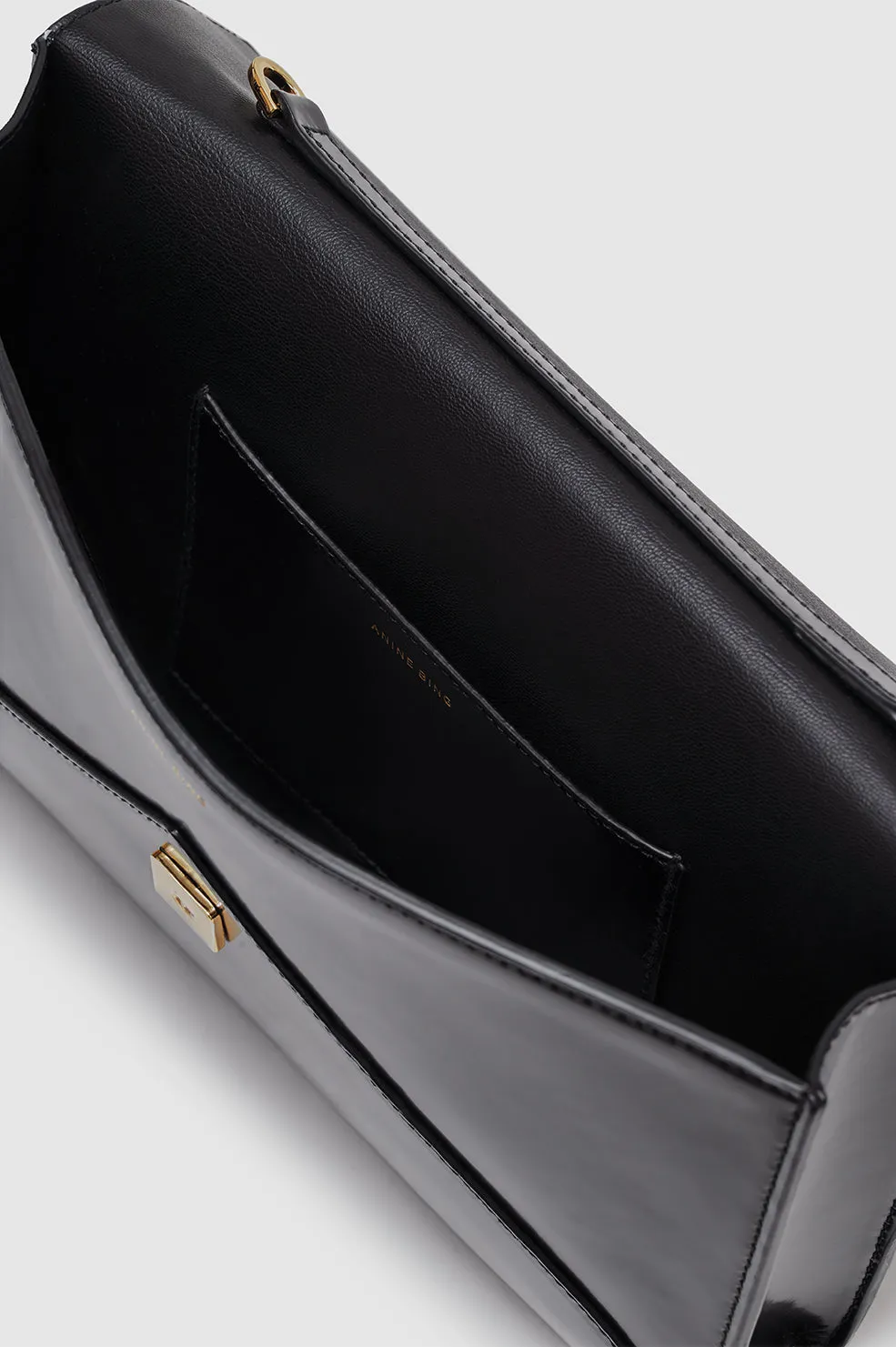 Elly Clutch - High-Shine Black