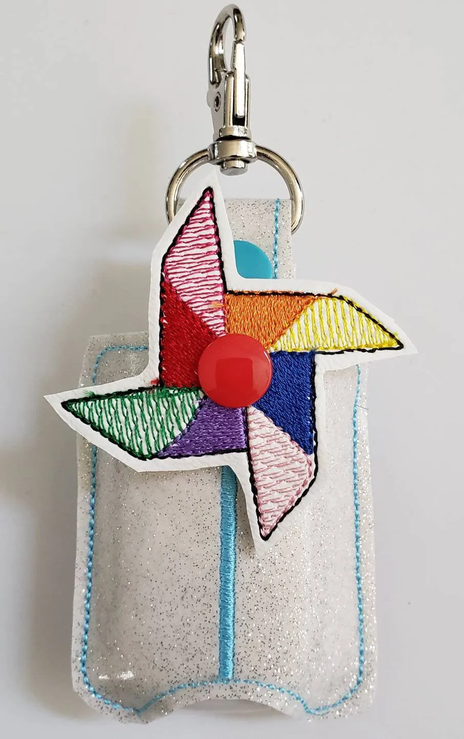 Hand sanitizer holder - glitter vinyl Pinwheel hand sanitizer holder - purse tag - sports bag tag - hand sanitizer fob - back pack tag
