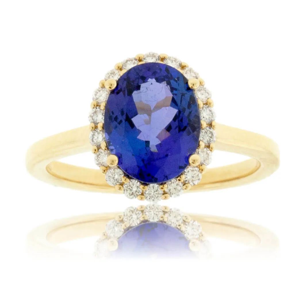 Oval Tanzanite & Diamond Halo Yellow Gold Ring