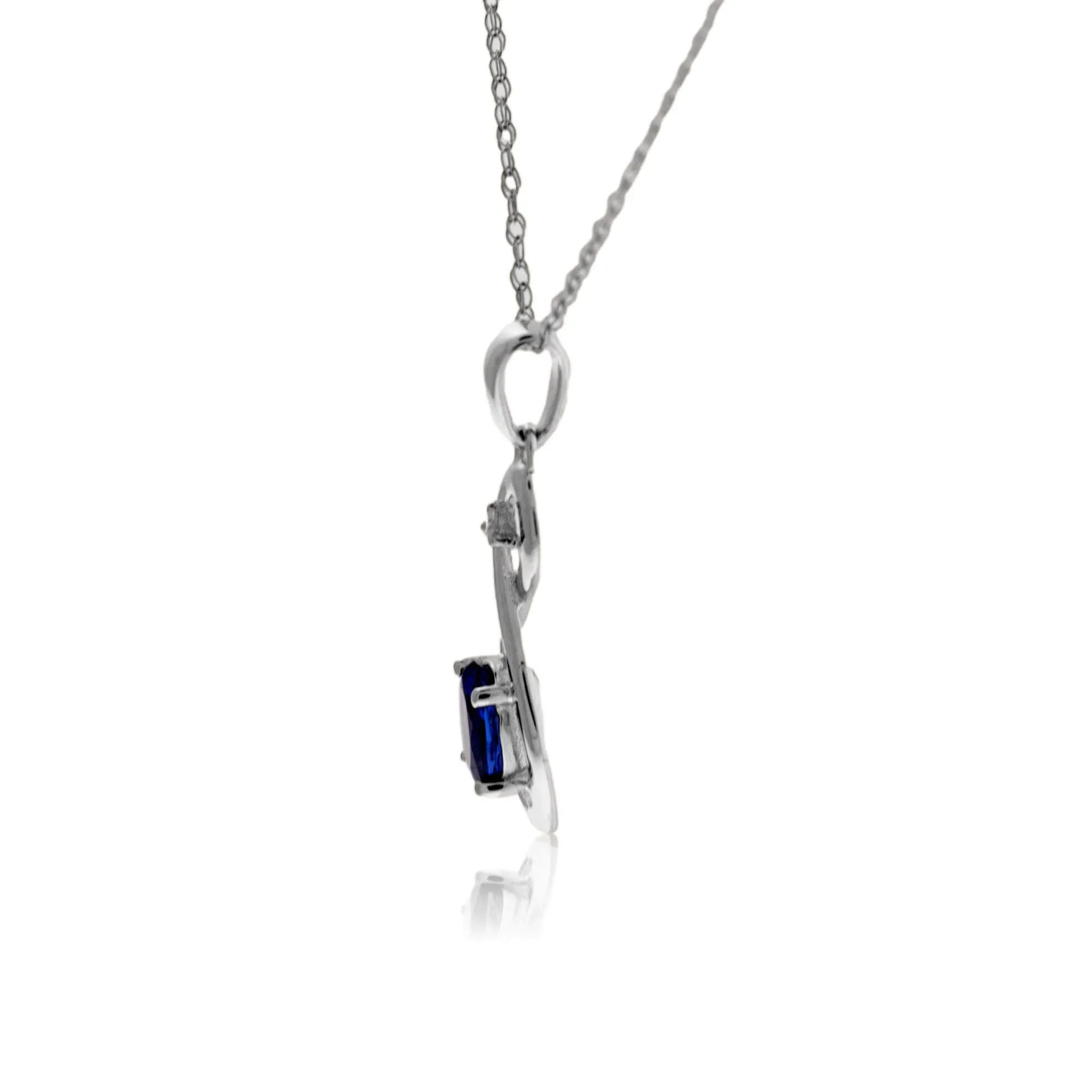 Oval Tanzanite & Diamond Infinity Style Pendant